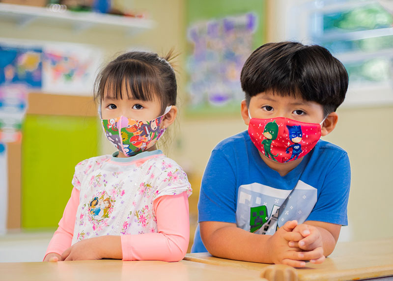 RPS-replacement two Asian preschoolers with masks