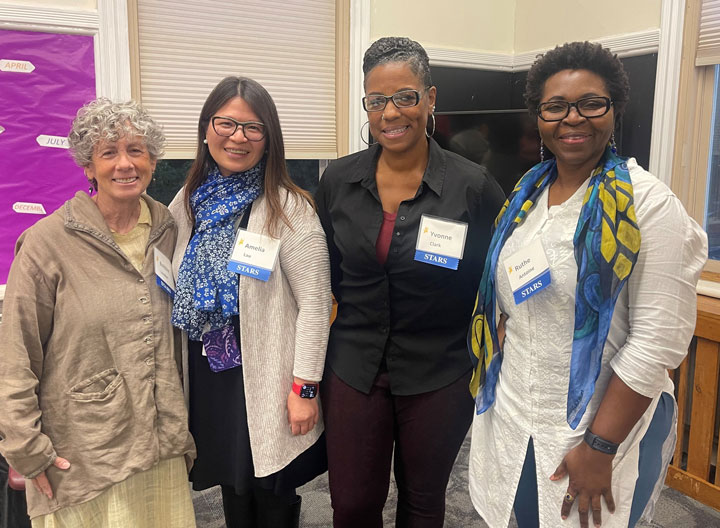 Photo of 4 clinitians, all women, diverse races